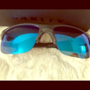Oakley blue iridium lens and dark grey frame